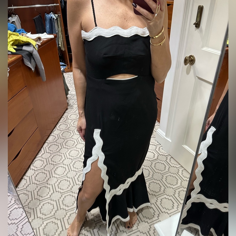 Jonathan Simkhai
Black strapless white trim dress
Size 8